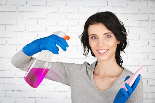 Supervisor reviewing safe work practices with cleaning staff